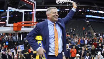 KANSAS CITY, MISSOURI - MARCH 31: Head coach Bruce Pearl of the Auburn Tigers celebrates by cutting down the nets after their 77-71 win over the Kentucky Wildcats in the 2019 NCAA Basketball Tournament Midwest Regional at Sprint Center on March 31, 2019 in Kansas City, Missouri. (Photo by Jamie Squire/Getty Images)