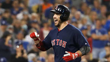 LOS ANGELES, CA - OCTOBER 28: Steve Pearce #25 of the Boston Red Sox celebrates his eighth inning home run against the Los Angeles Dodgers in Game Five of the 2018 World Series at Dodger Stadium on October 28, 2018 in Los Angeles, California. (Photo by Sean M. Haffey/Getty Images)