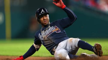 PHILADELPHIA, PA - MAY 22: Ozzie Albies #1 of the Atlanta Braves slides into third base on a throwing error by right fielder Nick Williams of the Philadelphia Phillies on a single by Freddie Freeman during the fifth inning of a game at Citizens Bank Park on May 22, 2018 in Philadelphia, Pennsylvania. The Braves defeated the Phillies 3-1. (Photo by Rich Schultz/Getty Images)