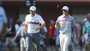 Aug 3, 2014; Akron, OH, USA; Sergio Garcia (left) and Rory McIlroy (right) walk the 14th hole together during the final round of the WGC-Bridgestone Invitational golf tournament at Firestone Country Club - South Course. Mandatory Credit: Joe Maiorana-USA TODAY Sports
