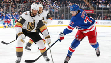 NEW YORK, NY - DECEMBER 02: Filip Chytil #72 of the New York Rangers shoots the puck against Deryk Engelland #5 of the Vegas Golden Knights at Madison Square Garden on December 2, 2019 in New York City. (Photo by Jared Silber/NHLI via Getty Images)
