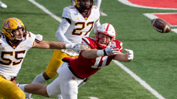 Dec 12, 2020; Lincoln, Nebraska, USA; Nebraska Cornhuskers tight end Austin Allen (11) attempts to catch a pass against Minnesota Golden Gophers linebacker Mariano Sori-Marin (55) during the fourth quarter at Memorial Stadium. Mandatory Credit: Dylan Widger-USA TODAY Sports