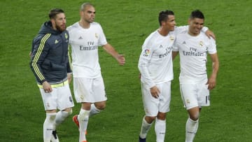 Real Madrid's defender Sergio Ramos (L), Real Madrid's Portuguese defender Pepe (2nd L), Real Madrid's Portuguese forward Cristiano Ronaldo (2nd R) and Real Madrid's Brazilian midfielder Casemiro celebrate after winning the Spanish league 'Clasico' football match FC Barcelona vs Real Madrid CF at the Camp Nou stadium in Barcelona on April 2, 2016. / AFP / PAU BARRENA (Photo credit should read PAU BARRENA/AFP/Getty Images)