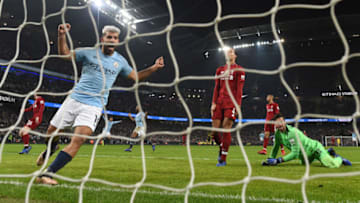 MANCHESTER, ENGLAND - JANUARY 03: Sergio Aguero of Manchester City celebrates hsi sides second goal as Virgil van Dijk of Liverpool and Alisson of Liverpool react during the Premier League match between Manchester City and Liverpool FC at the Etihad Stadium on January 3, 2019 in Manchester, United Kingdom. (Photo by Shaun Botterill/Getty Images)