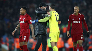 LIVERPOOL, ENGLAND - DECEMBER 16: Jurgen Klopp, Manager of Liverpool and Alisson of Liverpool celebrate following their sides victory in the Premier League match between Liverpool FC and Manchester United at Anfield on December 16, 2018 in Liverpool, United Kingdom. (Photo by Clive Brunskill/Getty Images)