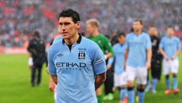 LONDON, ENGLAND - MAY 11: Gareth Barry of Manchester City looks dejected in defeat after the FA Cup with Budweiser Final between Manchester City and Wigan Athletic at Wembley Stadium on May 11, 2013 in London, England. (Photo by Mike Hewitt/Getty Images)
