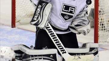 May 8, 2013; St. Louis, MO, USA; Los Angeles Kings goalie Jonathan Quick (32) makes a save against the St. Louis Blues during overtime in game five of the first round of the 2013 Stanley Cup Playoffs at Scottrade Center. The Kings defeated the Blues 3-2. Mandatory Credit: Scott Rovak-USA TODAY Sports