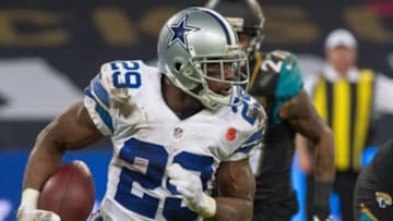 Nov 9, 2014; London, UNITED KINGDOM; Dallas Cowboys running back DeMarco Murray (29) looks for room to run during the second half of the game Dallas Cowboys and the Jacksonville Jaguars at Wembley Stadium Mandatory Credit: Steve Flynn-USA TODAY Sports
