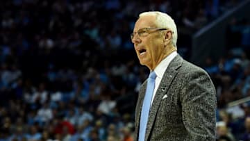 CHARLOTTE, NC - MARCH 18: Head coach Roy Williams of the North Carolina Tar Heels reacts from the sideline against the Texas A