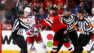 NEWARK, NEW JERSEY - APRIL 20: Timo Meier #96 of the New Jersey Devils gets the stick on h23 during the third period during Game Two in the First Round of the 2023 Stanley Cup Playoffs at the Prudential Center on April 20, 2023 in Newark, New Jersey. The Rangers defeated the Devils 5-1. (Photo by Bruce Bennett/Getty Images)