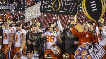 TAMPA, FL - JANUARY 09: Clemson Tigers players celebrate following the College Football Playoff National Championship game between the Alabama Crimson Tide and the Clemson Tigers on January 9, 2017, at Raymond James Stadium in Tampa, FL. Clemson won the game 35-31. (Photo by David Rosenblum/Icon Sportswire via Getty Images)