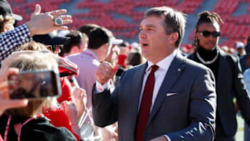 Georgia coach Kirby Smart shakes hands with fans during the Dawg Walk before the start of a NCAA college football game against Kentucky in Athens, Ga., on Saturday, Oct. 7, 2023.