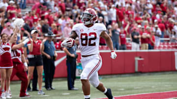 FAYETTEVILLE, AR - OCTOBER 6: Irv Smith Jr. #82 of the Alabama Crimson Tide runs the ball in for a touchdown in the first half of a game against the Arkansas Razorbacks at Razorback Stadium on October 6, 2018 in Tuscaloosa, Alabamai. (Photo by Wesley Hitt/Getty Images)
