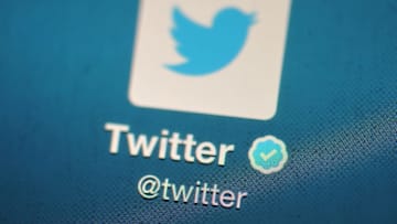 LONDON, ENGLAND - NOVEMBER 07: In this photo illustration, The Twitter logo is displayed on a mobile device as the company announced it's initial public offering and debut on the New York Stock Exchange on November 7, 2013 in London, England. Twitter went public on the NYSE opening at USD 26 per share, valuing the company's worth at an estimated USD 18 billion. (Photo by Bethany Clarke/Getty Images)