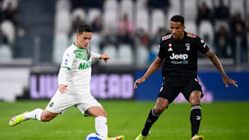 ALLIANZ STADIUM, TURIN, ITALY - 2021/10/27: Giacomo Raspadori (L) of US Sassuolo is challenged by Danilo Luiz da Silva of Juventus FC during the Serie A football match between Juventus FC and US Sassuolo. US Sassuolo won 2-1 over Juventus FC. (Photo by Nicolò Campo/LightRocket via Getty Images)