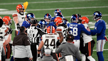 A flag is thrown as New York Giants players get tangled up with Cleveland Browns players on the sideline in the second half. The Giants lose to the Browns, 20-6, at MetLife Stadium on Sunday, December 20, 2020, in East Rutherford.Nyg Vs Cle