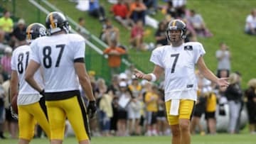 Jul 29, 2013; Latrobe, PA, USA; Pittsburgh Steelers quarterback Ben Roethlisberger (7) talk with Pittsburgh Steelers tight end Matt Spaeth (87) during practice at St. Vincent College. Mandatory Credit: Vincent Pugliese-USA TODAY Sports