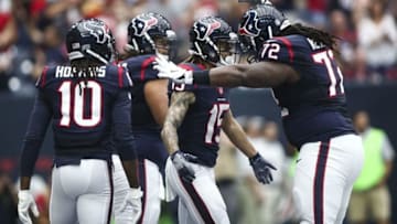 Oct 2, 2016; Houston, TX, USA; Houston Texans wide receiver Will Fuller (15) celebrates with tackle Derek Newton (72) after scoring a touchdown during the first quarter against the Tennessee Titans at NRG Stadium. Mandatory Credit: Troy Taormina-USA TODAY Sports
