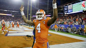 Dec 31, 2016; Phoenix, AZ, USA; Clemson Tigers quarterback Deshaun Watson (4) celebrates a touchdown over Ohio State during the fourth quarter during the 2016 CFP semifinal at University of Phoenix Stadium. Mandatory Credit: Rob Schumacher/The Arizona Republic via USA TODAY Sports