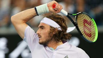 MELBOURNE, AUSTRALIA - JANUARY 24: Stefanos Tsitsipas of Greece plays a shot during his Men's Singles third round match against Milos Raonic of Canada on day five of the 2020 Australian Open at Melbourne Park on January 24, 2020 in Melbourne, Australia. (Photo by Jack Thomas/Getty Images)