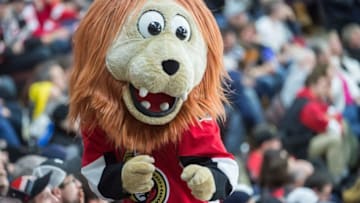 Feb 20, 2016; Ottawa, Ontario, CAN; Spartacat entertains the fans in the match between the Detroit Red Wings and Ottawa Senators at the Canadian Tire Centre. The Senators defeated the Red Wings 3-2 in a shootout. Mandatory Credit: Marc DesRosiers-USA TODAY Sports
