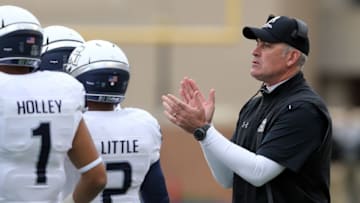 Nov 21, 2015; Hattiesburg, MS, USA; Old Dominion Monarchs head coach Bobby Wilder claps on the sidelines during their game against the Southern Miss Golden Eagles at M.M. Roberts Stadium. Mandatory Credit: Chuck Cook-USA TODAY Sports