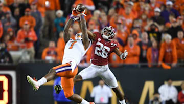 Jan 9, 2017; Tampa, FL, USA; Clemson Tigers wide receiver Mike Williams (7) makes a catch ahead of Alabama Crimson Tide defensive back Marlon Humphrey (26) during the fourth quarter in the 2017 College Football Playoff National Championship Game at Raymond James Stadium. Mandatory Credit: John David Mercer-USA TODAY Sports