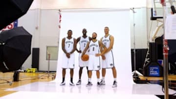 Sep 26, 2014; East Rutherford, NJ, USA; Brooklyn Nets shooting guard Joe Johnson (7) and center Kevin Garnett (2) and point guard Deron Williams (8) and center Brook Lopez (11) pose for a photo during media day at the Brooklyn Nets Practice Facility. Mandatory Credit: Brad Penner-USA TODAY Sports