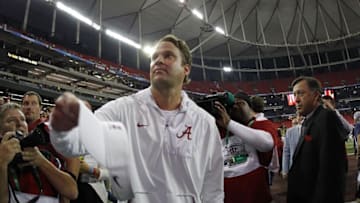 Dec 3, 2016; Atlanta, GA, USA; Alabama Crimson Tide offensive coordinator Lane Kiffin throws his visor into the crowd after the SEC Championship college football game against the Florida Gators at Georgia Dome. Alabama Crimson Tide won 54-16. Mandatory Credit: Brett Davis-USA TODAY Sports