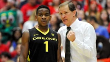 Feb 6, 2014; Tucson, AZ, USA; Oregon Ducks guard Dominic Artis (1) and head coach Dana Altman talk during the second half against the Arizona Wildcats at McKale Center. Arizona won 67-65. Mandatory Credit: Casey Sapio-USA TODAY Sports