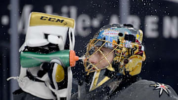 LAS VEGAS, NEVADA - DECEMBER 28: Marc-Andre Fleury #29 of the Vegas Golden Knights takes a break during a stop in play in the first period of a game against the Arizona Coyotes at T-Mobile Arena on December 28, 2019 in Las Vegas, Nevada. The Golden Knights defeated the Coyotes 4-1. (Photo by Ethan Miller/Getty Images)
