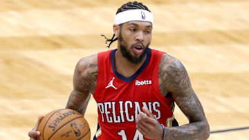 NEW ORLEANS, LOUISIANA - MARCH 11: Brandon Ingram #14 of the New Orleans Pelicans dribbles the ball down court during the third quarter of an NBA game against the New Orleans Pelicans at Smoothie King Center on March 11, 2021 in New Orleans, Louisiana. NOTE TO USER: User expressly acknowledges and agrees that, by downloading and or using this photograph, User is consenting to the terms and conditions of the Getty Images License Agreement. (Photo by Sean Gardner/Getty Images)