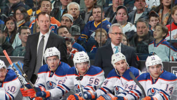 BUFFALO, NY - JANUARY 03: Assistant Coach Steve Smith (L) and Head Coach Tom Renney (R) of the Edmonton Oilers watch the action during the Oilers 4-3 loss to the Buffalo Sabres at First Niagara Center on January 3, 2012 in Buffalo, New York. (Photo by Bill Wippert/NHLI via Getty Images)