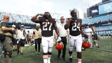 Kareem Hunt #27 of the Cleveland Browns and Nick Chubb #24 leave the field after defeating the Carolina Panthers at Bank of America Stadium on September 11, 2022 in Charlotte, North Carolina. (Photo by Jared C. Tilton/Getty Images)
