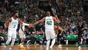 BOSTON, MA - APRIL 24: Jaylen Brown #7 and Al Horford #42 of the Boston Celtics exchange high fives in Game Five of Round One of the 2018 NBA Playoffs against the Milwaukee Bucks on April 24, 2018 at the TD Garden in Boston, Massachusetts. NOTE TO USER: User expressly acknowledges and agrees that, by downloading and or using this photograph, User is consenting to the terms and conditions of the Getty Images License Agreement. Mandatory Copyright Notice: Copyright 2018 NBAE (Photo by Brian Babineau/NBAE via Getty Images)