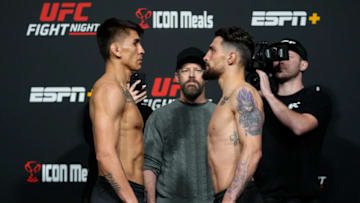 LAS VEGAS, NEVADA - FEBRUARY 18: (L-R) Mario Bautista and Jay Perrin face off during the UFC Fight Night weigh-in at UFC APEX on February 18, 2022 in Las Vegas, Nevada. (Photo by Jeff Bottari/Zuffa LLC)