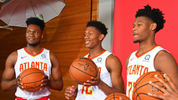 ATLANTA, GA - JUNE 25: Bruno Fernando #24, De'Andre Hunter #12 and Cam Reddish #22 of the Atlanta Hawks pose for a portrait on June 25, 2019 at the Emory Sports Medicine Complex in Atlanta, Georgia. NOTE TO USER: User expressly acknowledges and agrees that, by downloading and/or using this photograph, user is consenting to the terms and conditions of the Getty Images License Agreement. Mandatory Copyright Notice: Copyright 2019 NBAE (Photo by Scott Cunningham/NBAE via Getty Images)