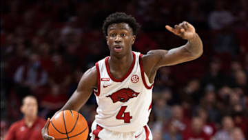 FAYETTEVILLE, ARKANSAS - JANUARY 04: Davonte Davis #4 of the Arkansas Razorbacks directs the offense during a game against the Vanderbilt Commodores at Bud Walton Arena on January 04, 2022 in Fayetteville, Arkansas. The Commodores defeated the Razorbacks 75-74. (Photo by Wesley Hitt/Getty Images)