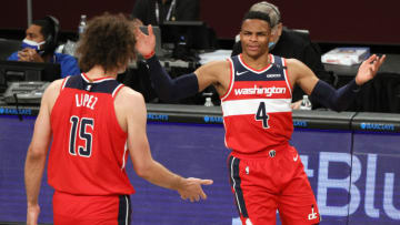 Russell Westbrook #4 reacts toward Robin Lopez #15 of the Washington Wizards (Photo by Sarah Stier/Getty Images)