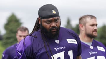 Jun 15, 2016; Minneapolis, MN, USA; Minnesota Vikings offensive lineman Phil Loadholt (71) walks off the field after practice at mini camp. Mandatory Credit: Brad Rempel-USA TODAY Sports