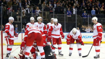 Nov 5, 2014; New York, NY, USA; Detroit Red Wings goalie Jonas Gustavsson (50) is tended to for an injury after the overtime period against the New York Rangers at Madison Square Garden. The Rangers defeated the Red Wings 4-3 in overtime. Mandatory Credit: Brad Penner-USA TODAY Sports