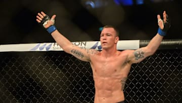 Colby Covington of the United States reacts to the crowd after a fight against Dong Hyun Kim of South Korea in their UFC welterweight event at the UFC Fight Night in Singapore on June 17, 2017. / AFP PHOTO / ROSLAN RAHMAN (Photo credit should read ROSLAN RAHMAN/AFP/Getty Images)