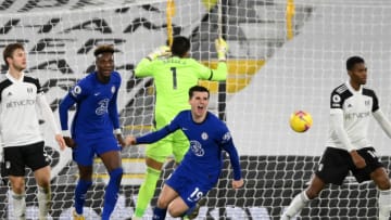 Chelsea's English midfielder Mason Mount (C) turns to celebrate after scoring the opening goal during the English Premier League football match between Fulham and Chelsea at Craven Cottage in London on January 16, 2021. (Photo by Mike Hewitt / POOL / AFP) / RESTRICTED TO EDITORIAL USE. No use with unauthorized audio, video, data, fixture lists, club/league logos or 'live' services. Online in-match use limited to 120 images. An additional 40 images may be used in extra time. No video emulation. Social media in-match use limited to 120 images. An additional 40 images may be used in extra time. No use in betting publications, games or single club/league/player publications. / (Photo by MIKE HEWITT/POOL/AFP via Getty Images)