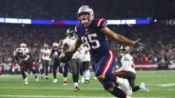 FOXBOROUGH, MASSACHUSETTS - OCTOBER 03: Hunter Henry #85 of the New England Patriots celebrates after scoring a touchdown against the Tampa Bay Buccaneers during the second quarter in the game at Gillette Stadium on October 03, 2021 in Foxborough, Massachusetts. (Photo by Adam Glanzman/Getty Images)