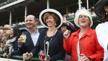 May 5, 2016; Louisville, KY, USA; Patrons and horse racing fans cheer during Thurby at Churchill Downs in advance of the 2016 Kentucky Derby. Mandatory Credit: Alton Strupp/Louisville Courier-Journal via USA TODAY NETWORK