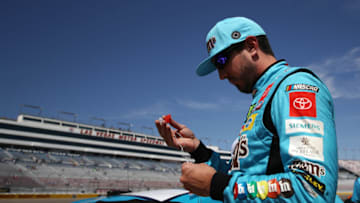 LAS VEGAS, NEVADA - SEPTEMBER 14: Kyle Busch, driver of the #18 M&M's Hazelnut Toyota, stands on the grid during qualifying for the Monster Energy NASCAR Cup Series South Point 400 at Las Vegas Motor Speedway on September 14, 2019 in Las Vegas, Nevada. (Photo by Chris Graythen/Getty Images)