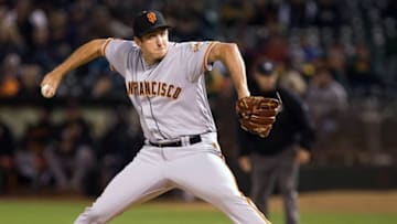 Jun 30, 2016; Oakland, CA, USA; San Francisco Giants relief pitcher Derek Law (64) pitches the ball against the Oakland Athletics during the ninth inning at Oakland Coliseum. The San Francisco Giants defeated the Oakland Athletics 12-6. Mandatory Credit: Kelley L Cox-USA TODAY Sports