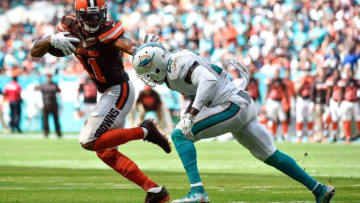 Sep 25, 2016; Miami Gardens, FL, USA; Cleveland Browns quarterback Terrelle Pryor (11) is tackled by Miami Dolphins free safety Reshad Jones (20) during the second half at Hard Rock Stadium. Mandatory Credit: Steve Mitchell-USA TODAY Sports