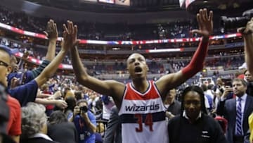 Apr 24, 2015; Washington, DC, USA; Washington Wizards forward Paul Pierce (34) celebrates with fans while leaving the court after the Wizards