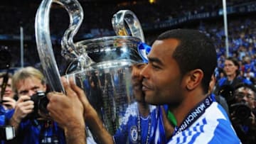 MUNICH, GERMANY - MAY 19: Ashley Cole of Chelsea celebrates with the trophy after their victory in the UEFA Champions League Final between FC Bayern Muenchen and Chelsea at the Fussball Arena München on May 19, 2012 in Munich, Germany. (Photo by Mike Hewitt/Getty Images)